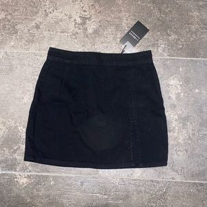 Black denim skirt